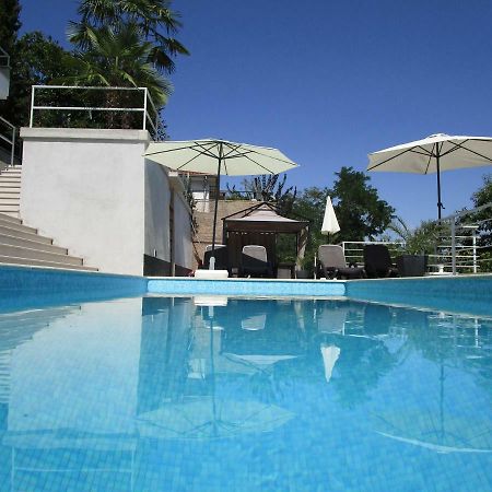 Villa Suzy-Apartments Suzana Ловран Екстер'єр фото